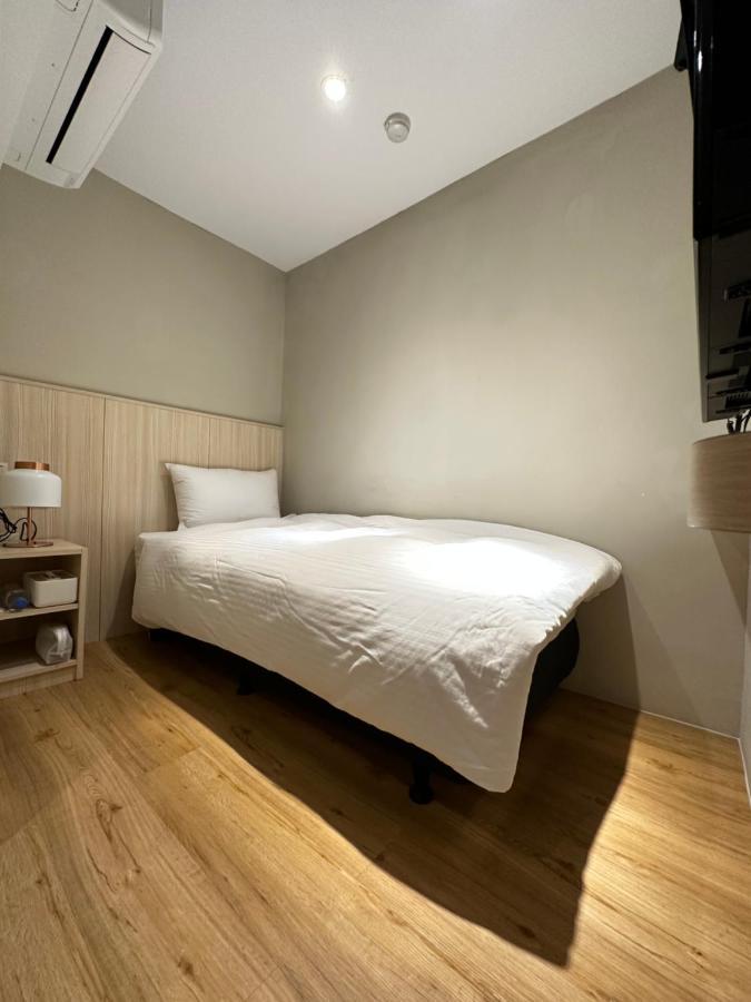 Yoshi Hotel - Tainan Station Branch Bagian luar foto